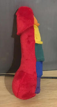 Red knotted penis with scales down the front, showing the 3D ridges